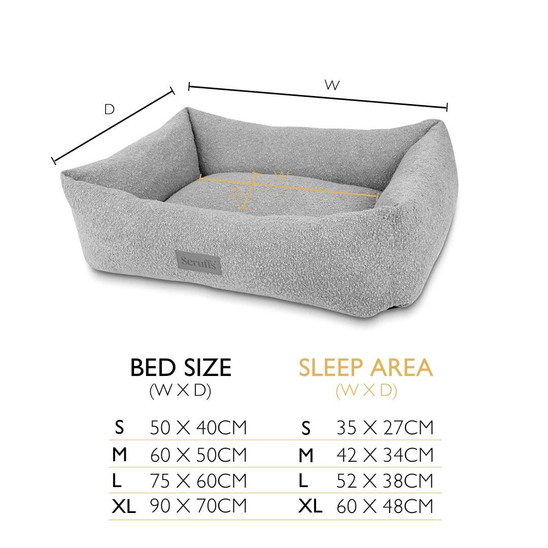 Grey dog bed with measurements on a white background