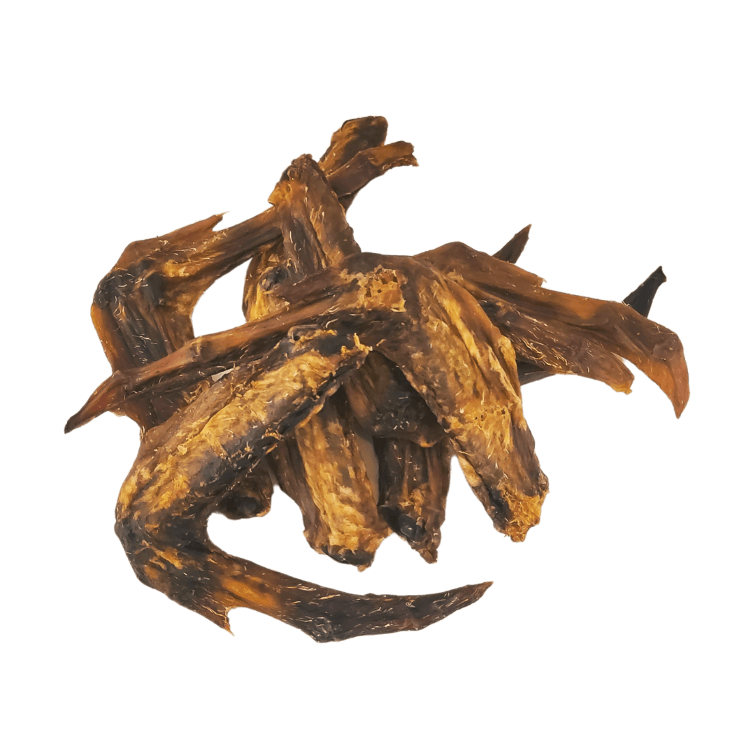 Air-dried duck wings natural dog treats on an all white background.