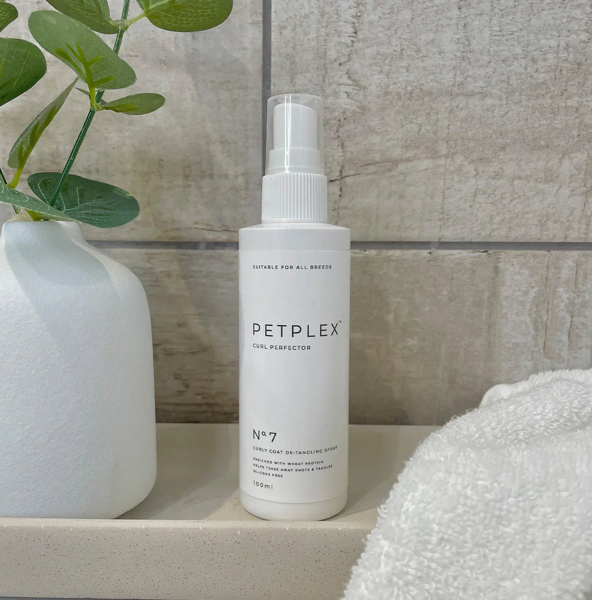 PetPlex No. 7 Curl Perfector Dog Detangler displayed in a bathroom setting