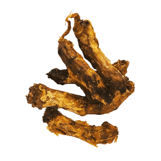 Five cooked and air-dried chicken neck natural dog treats stacked on top of each other on a white background.