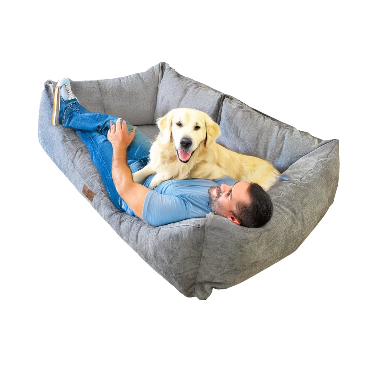 Person relaxing with dog on Baker & Bray human dog bed