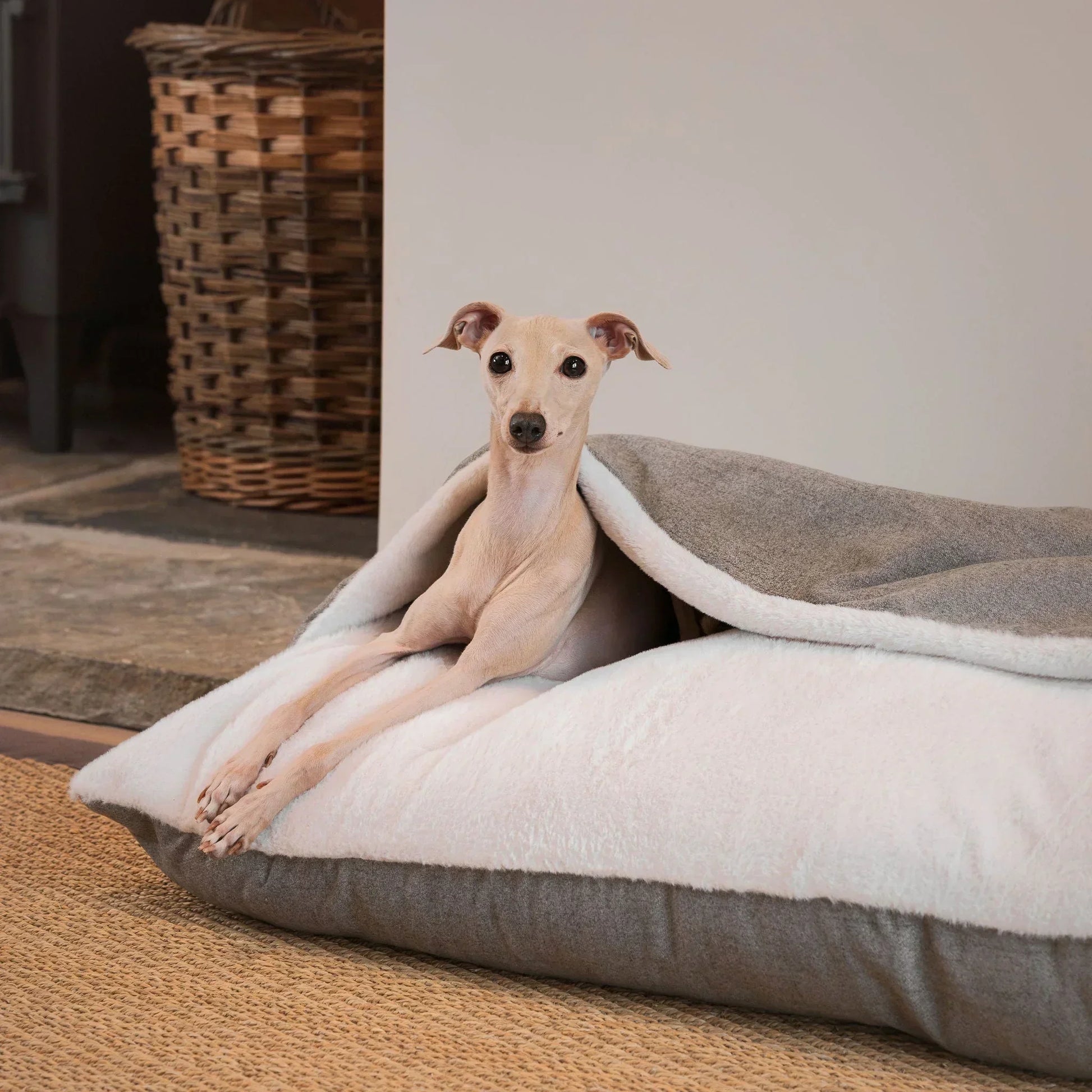 Close up of the Lords & Labradors Sleepy Burrows dog bed showing soft inner lining and burrow hood.