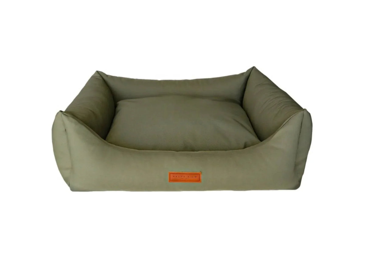 Ralph & Co Henley Waterproof Orthopaedic Memory Foam Dog Bed in green with raised sides.