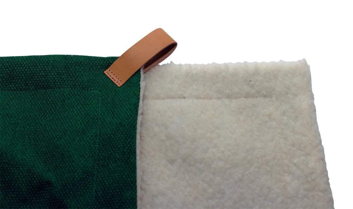 Corner detail showing bottle green fabric and sherpa lining