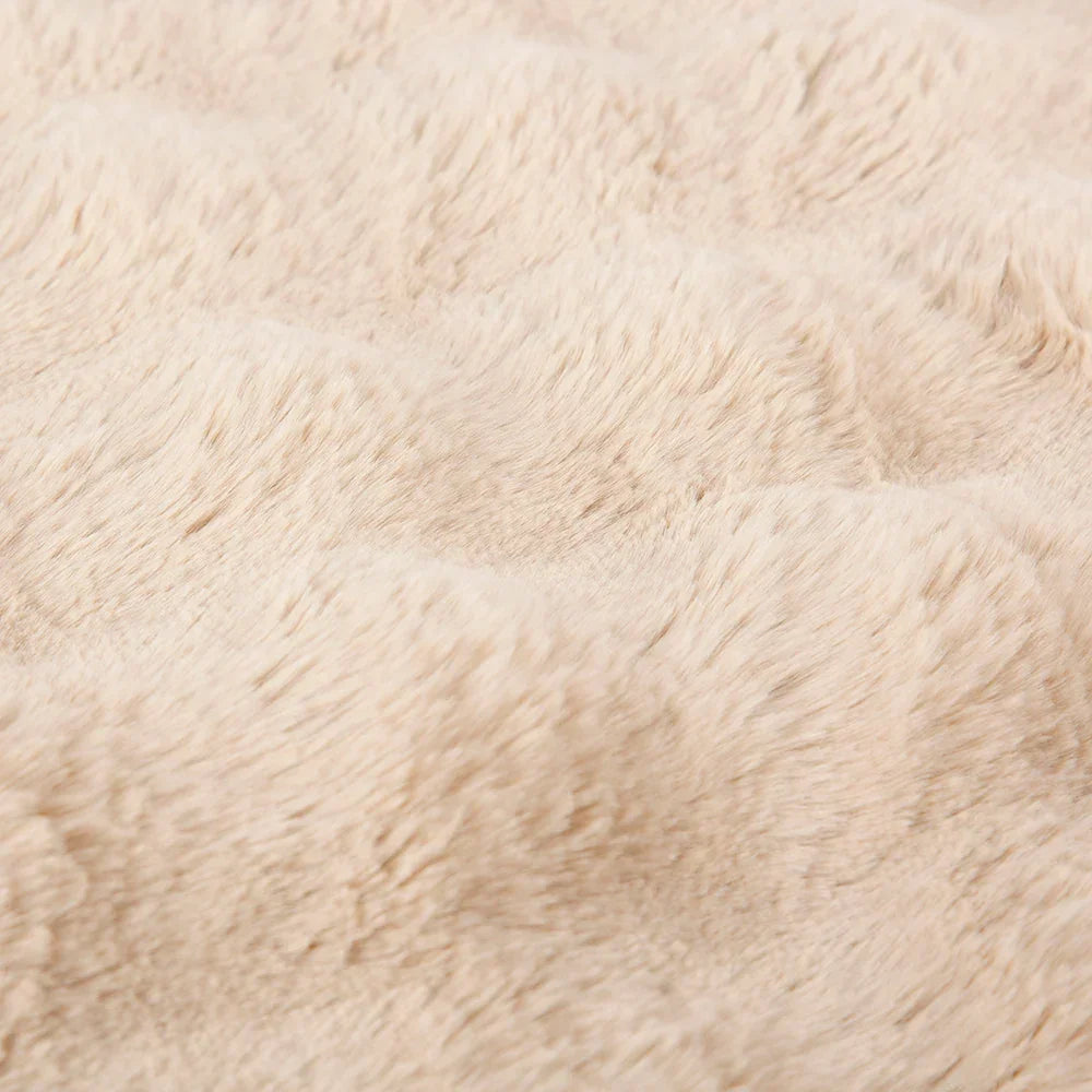 Close-up of champagne faux fur on Alpine dog mattress