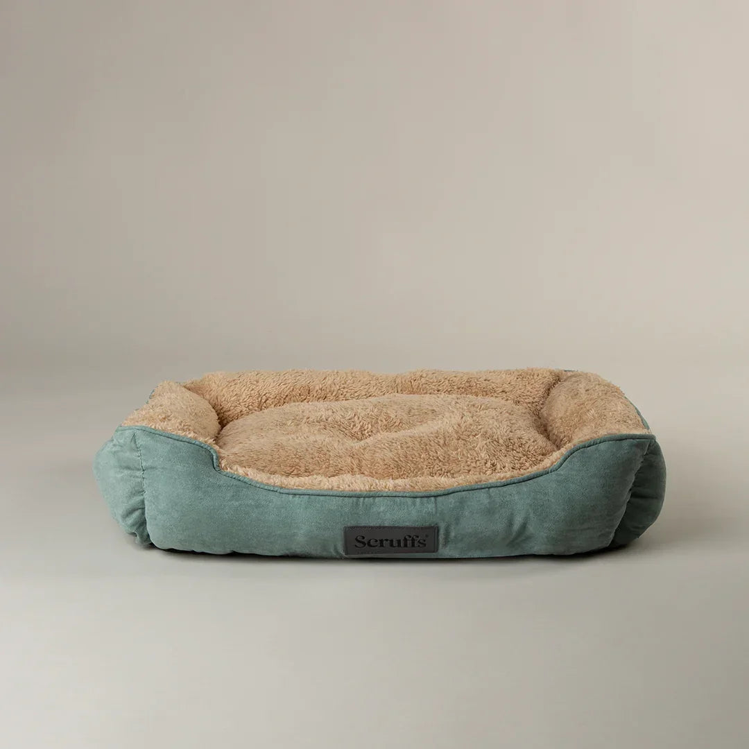 Sage green Scruffs cosy soft-walled dog bed with beige plush interior