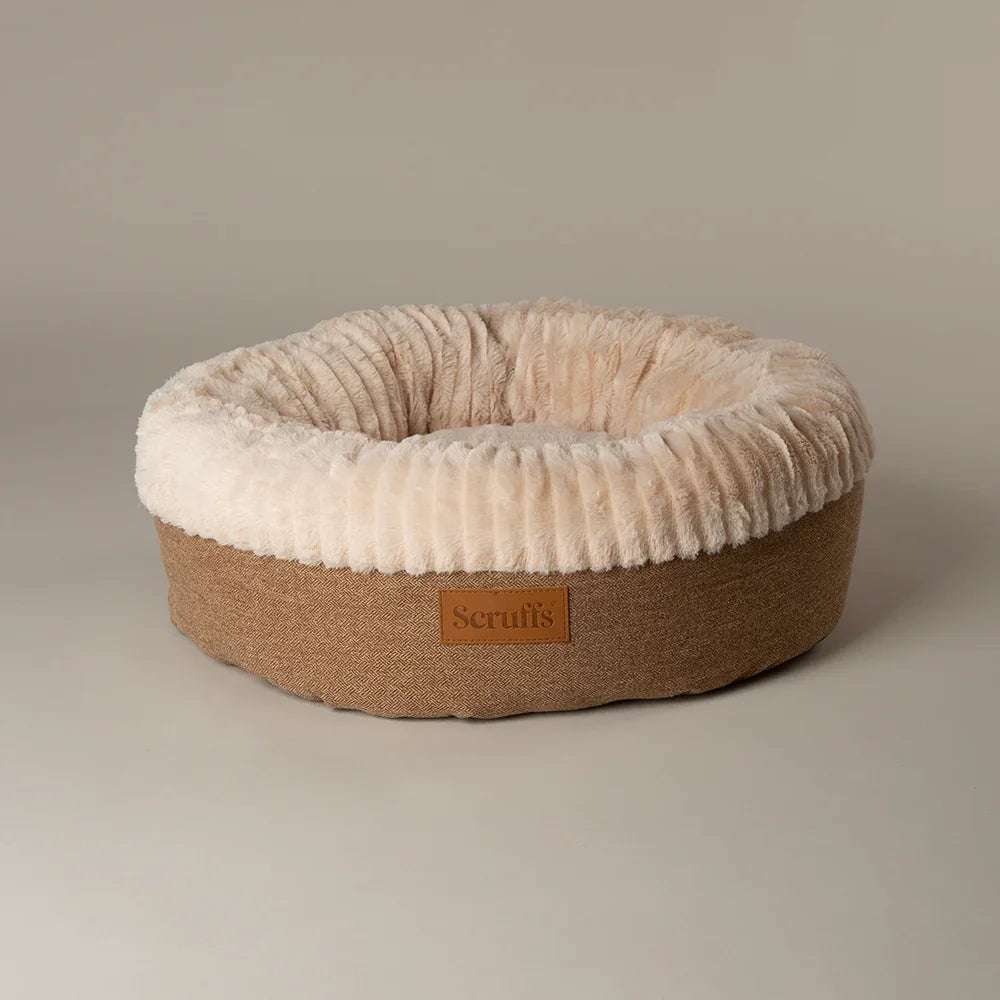Scruffs Ellen donut dog bed in tan on a plain light background.