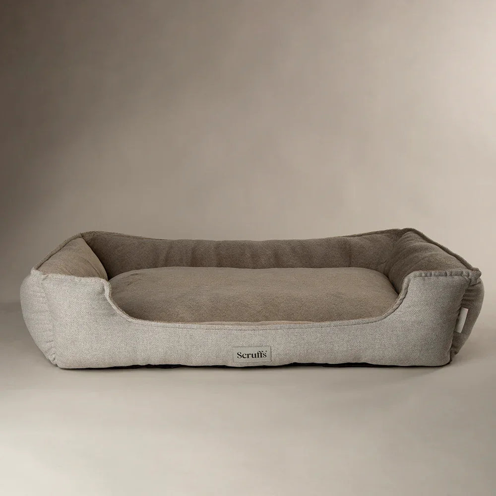 Scruffs Harvard pearl grey memory foam dog bed with raised sides on a neutral background