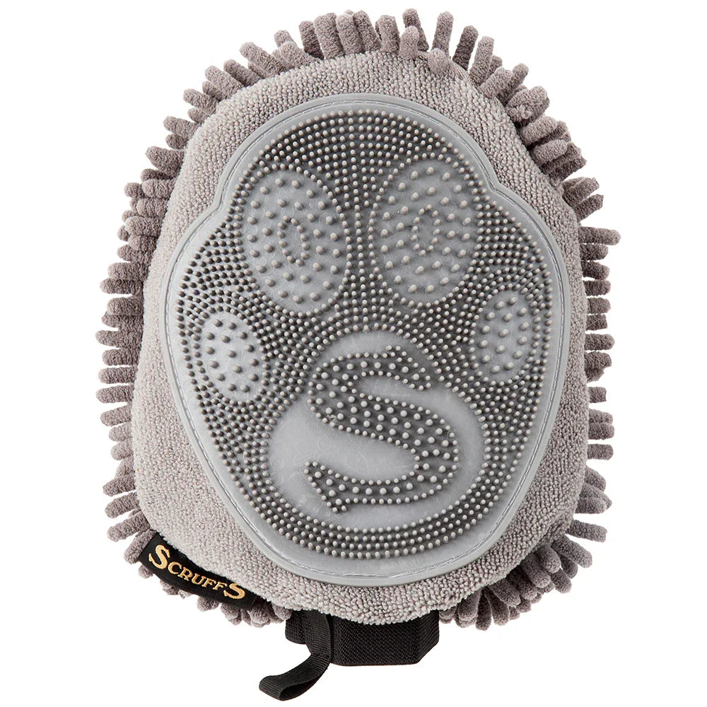 Rubber grooming comb on the reverse side of a dog drying mitt